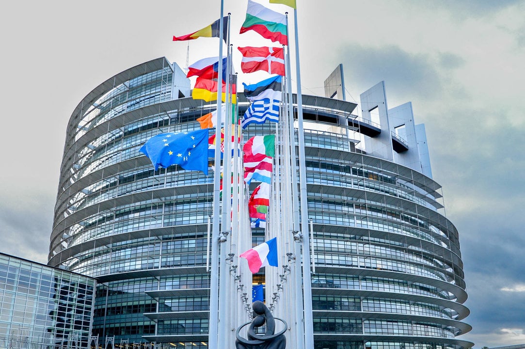 European flags at half-mast in front of the European Parliament building in Strasbourg in honour of former European Commission President Jacques Delors